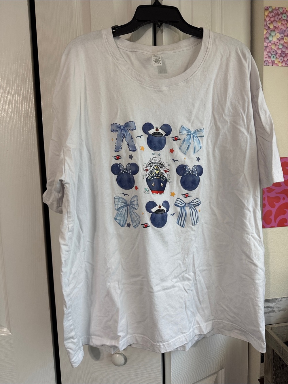 White Short Sleeve Graphic Tee with Navy Bow & Icon Motifs